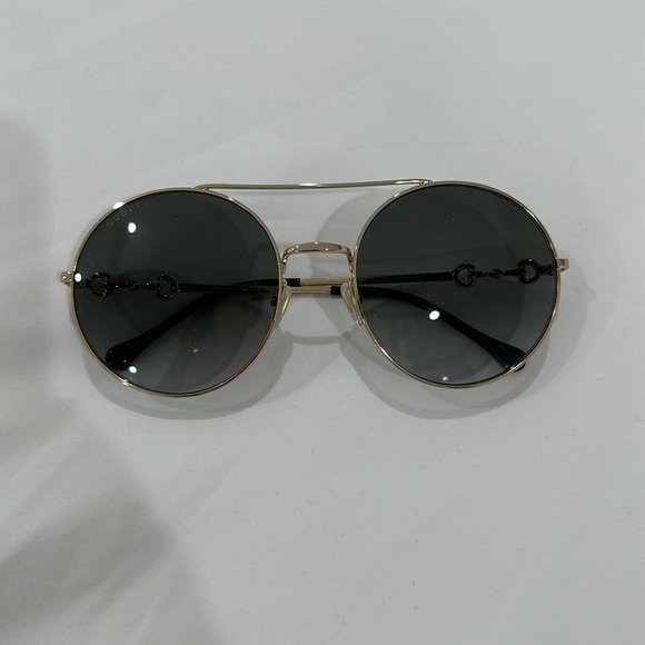 Gucci Accessories - Gucci round glasses. Gold. Comes with box, never worn
